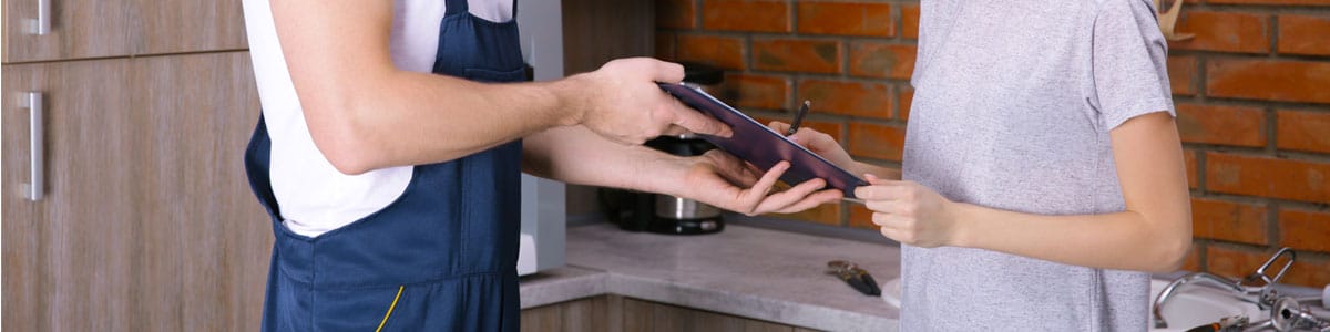 Woman Signing Receipt